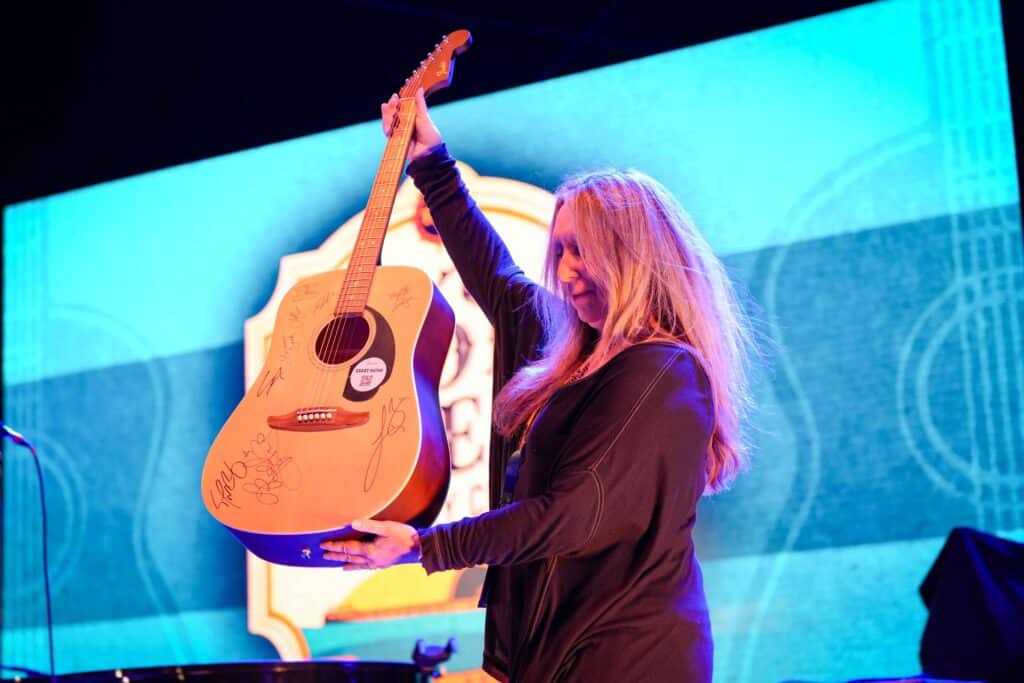 Signed guitar auctioned for St. Jude